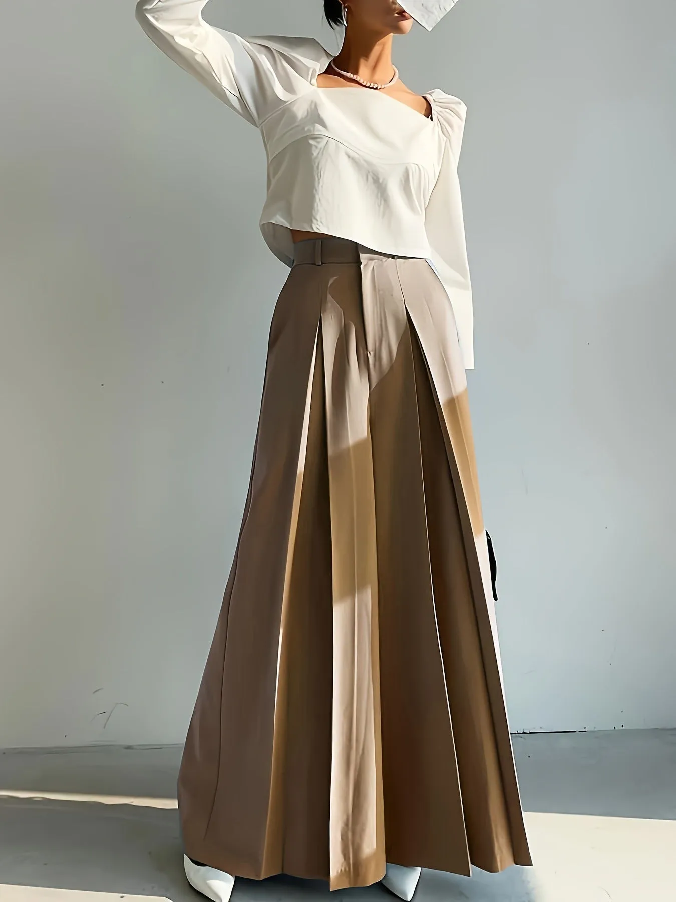 Elegant High-Waist Wide-Leg Pants with Sophisticated Pleated Detailing
