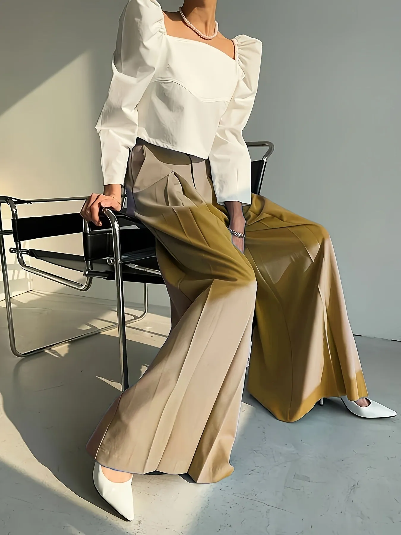 Elegant High-Waist Wide-Leg Pants with Sophisticated Pleated Detailing