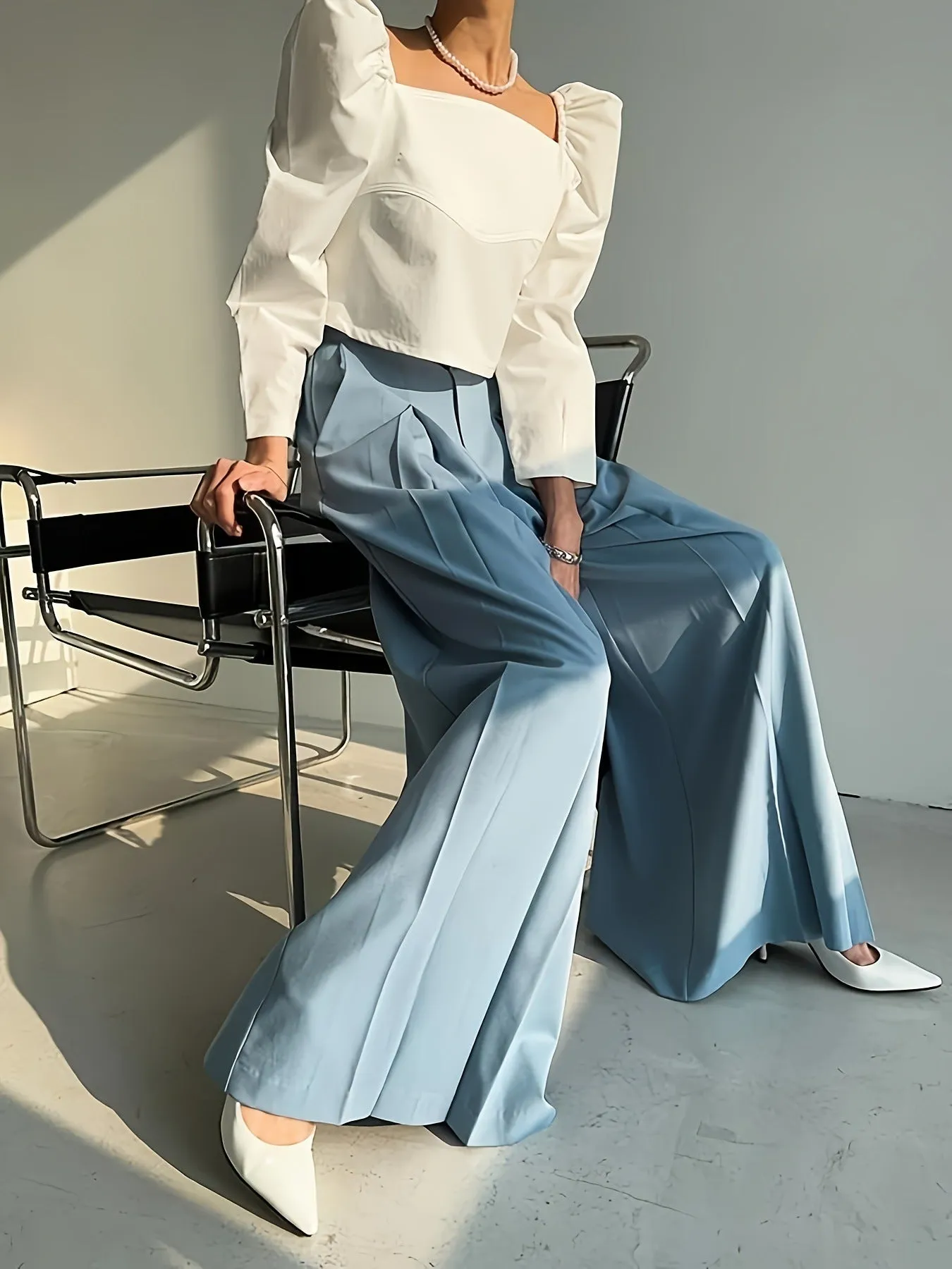 Elegant High-Waist Wide-Leg Pants with Sophisticated Pleated Detailing