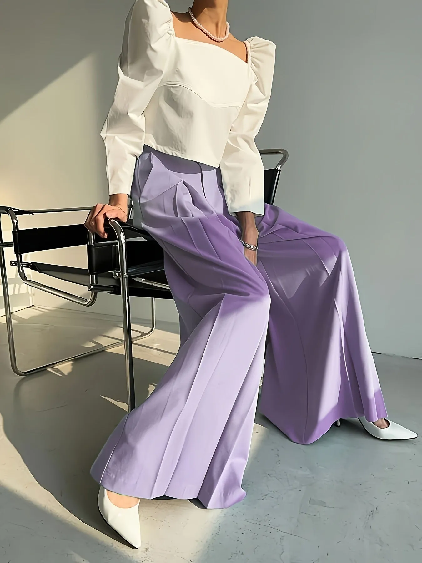 Elegant High-Waist Wide-Leg Pants with Sophisticated Pleated Detailing