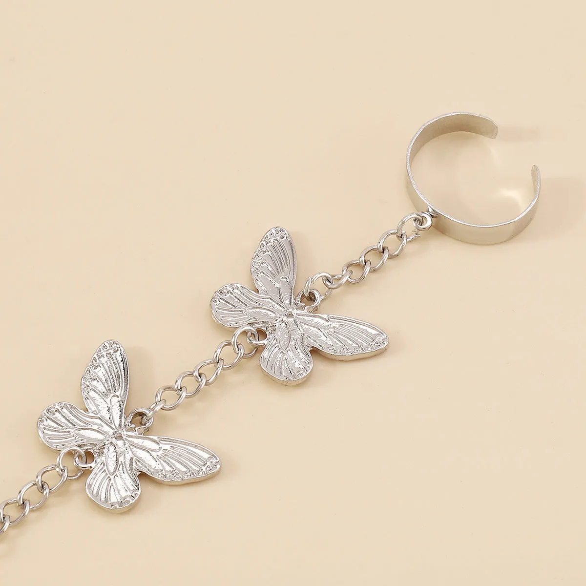 Silver-Plated Butterfly Wrist-To-Ring Bracelet